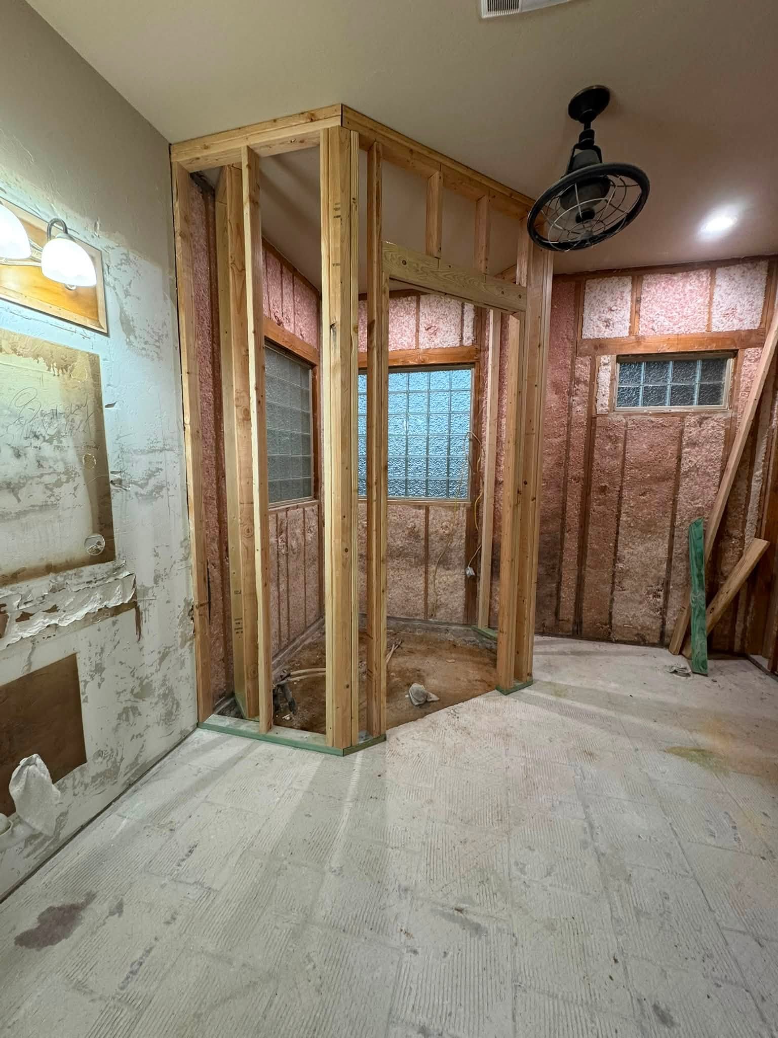 Framed shower opening during interior framing and drywall work
